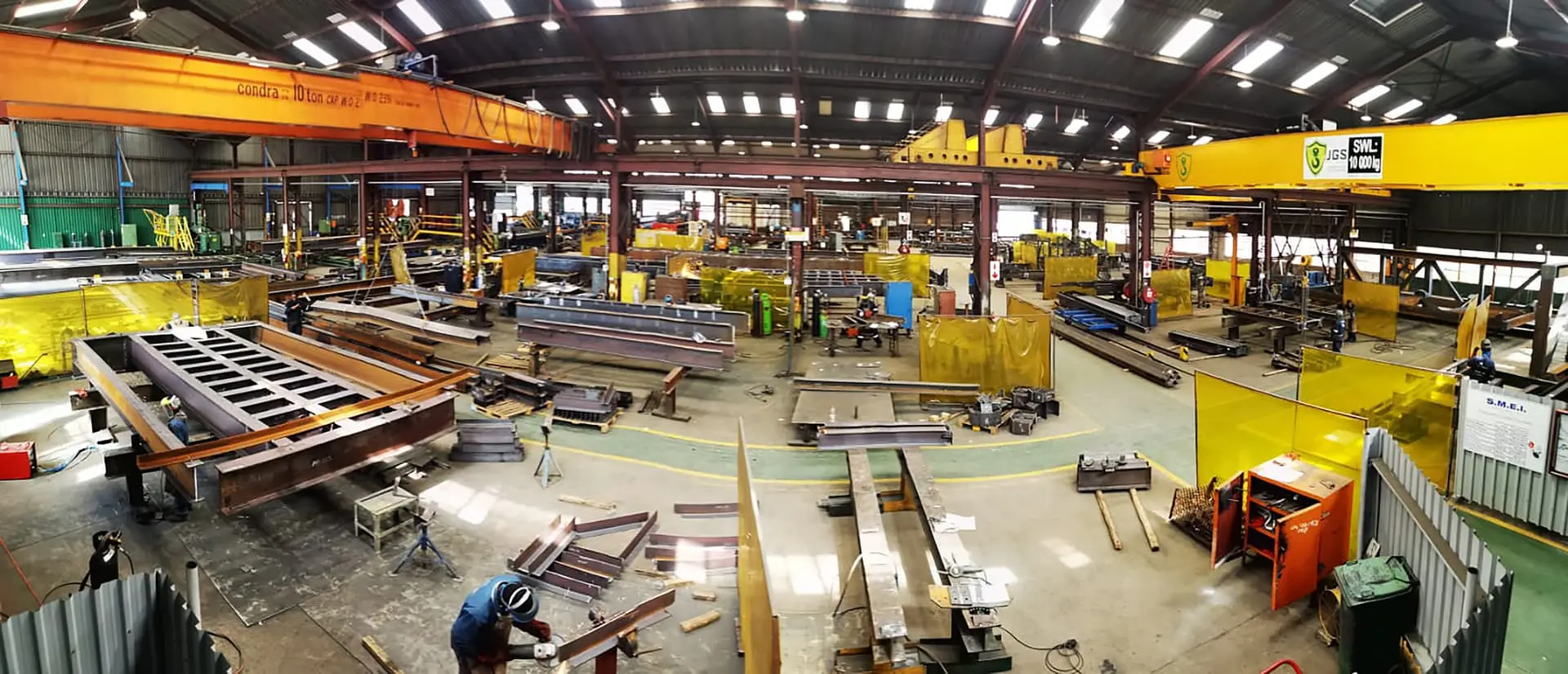 S.M.E.I. Projects fabrication workshop with overhead cranes and steel assemblies